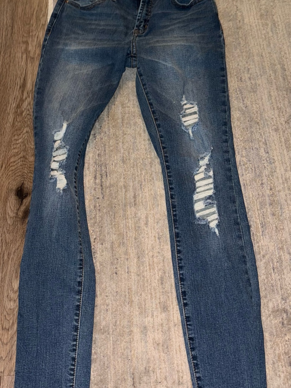 Distressed Women's Skinny Jeans in Dark Blue